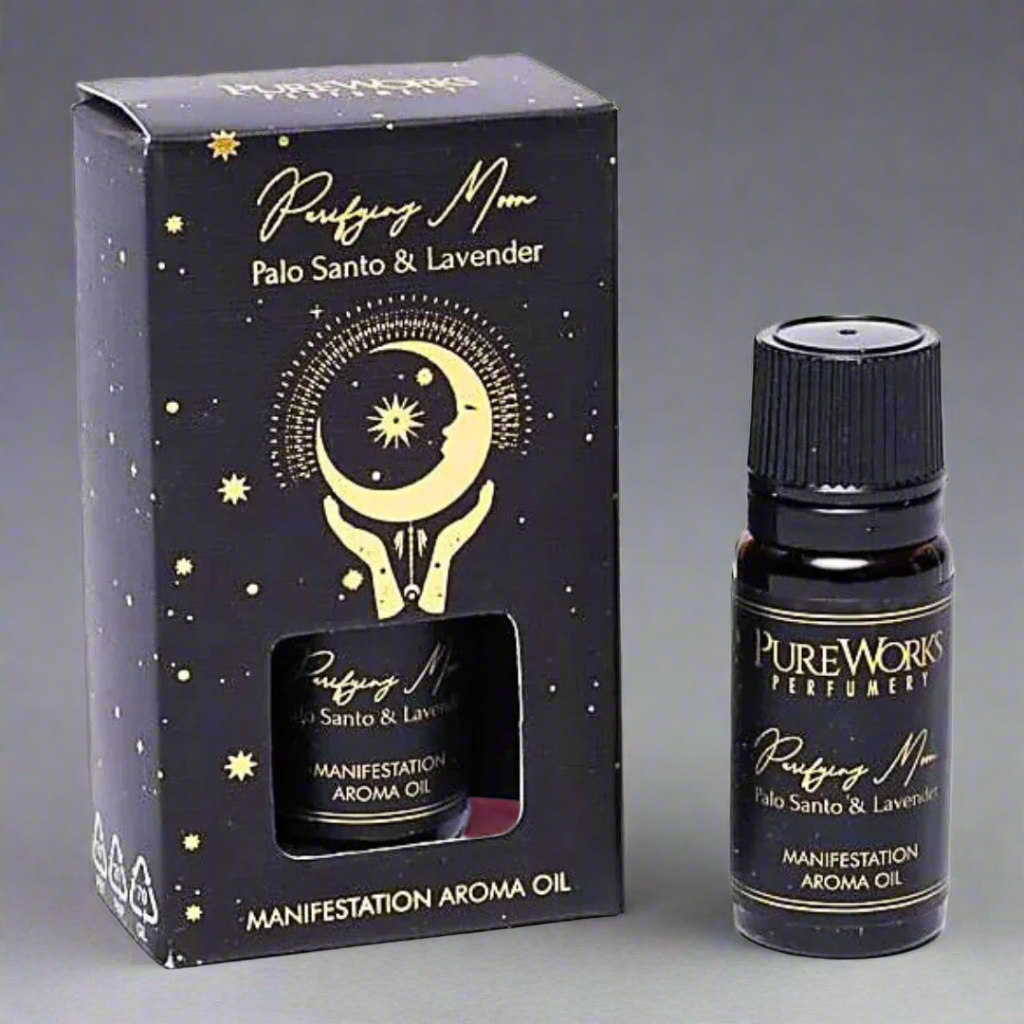 Aroma oil bottle with packaging featuring celestial design on a white background