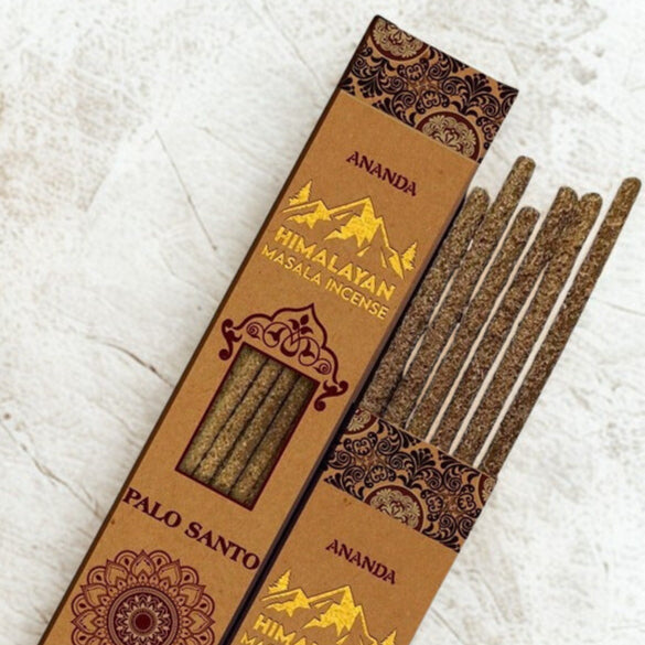 Himalayan Masala Incense packaging with incense sticks on a textured surface