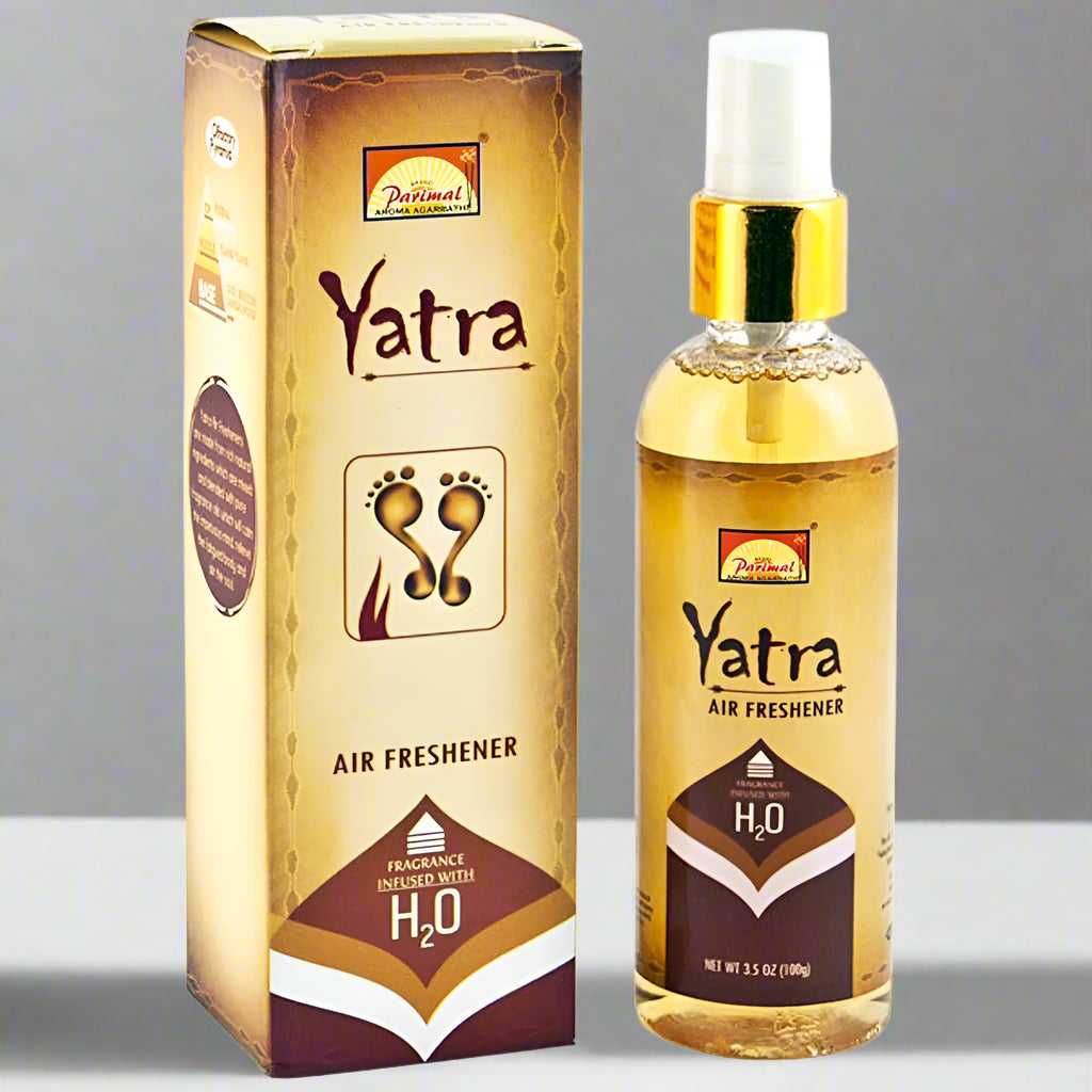 A product image showing a bottle of Parimal Yatra Natural Air Freshener next to its packaging box.