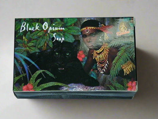 Soap packaging with a black panther and person in a jungle setting, labeled 'Black Opium Soap'.