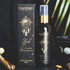 Pure Works perfume bottle and packaging with decorative items on a dark background
