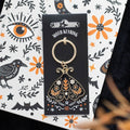 Folk Moth Enamel Keyring