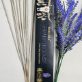 A packet of Banjara Aztec incense sticks with Frankincense fragrance, displayed alongside decorative purple flowers.