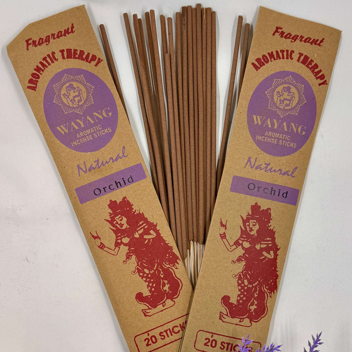 A packet of Balinese Orchid incense with 20 sticks, displayed alongside flowers and a label that indicates 'Wayang' and 'Natural Orchid 2015'.