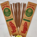 A collection of incense sticks with jasmine fragrance, labeled 'Wayang', arranged in a fan-like spread against a white background, with a bundle of white flowers to the side.