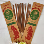 A collection of incense sticks with jasmine fragrance, labeled 'Wayang', arranged in a fan-like spread against a white background, with a bundle of white flowers to the side.