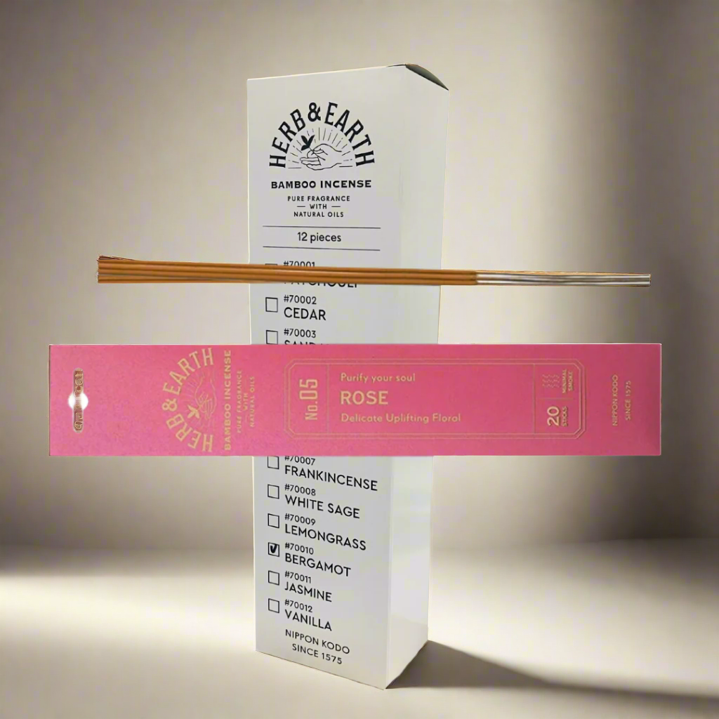 Herb & Earth incense packaging with sticks on a white background