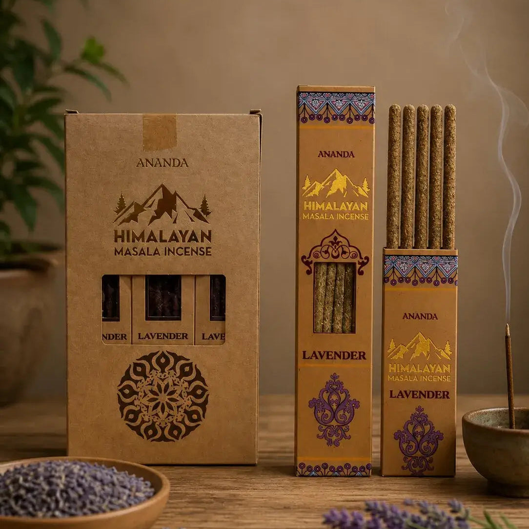 Three boxes of Ananda Himalayan Masala Incense in different scents (Nadar, Lavender, and Lavanda) arranged on a wooden table with decorative lavender sprigs and a bowl of dried lavender.